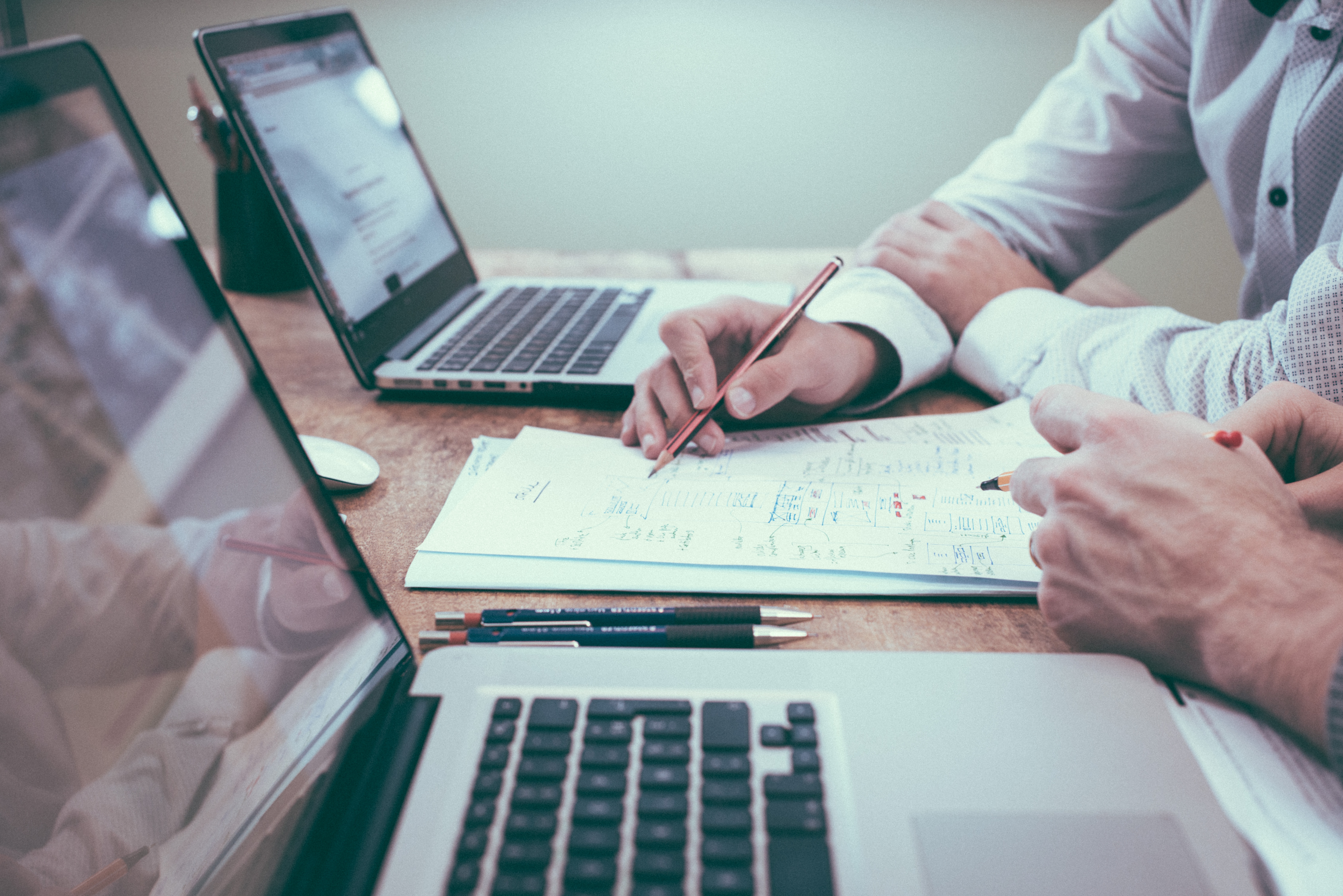 Accountant at work with client